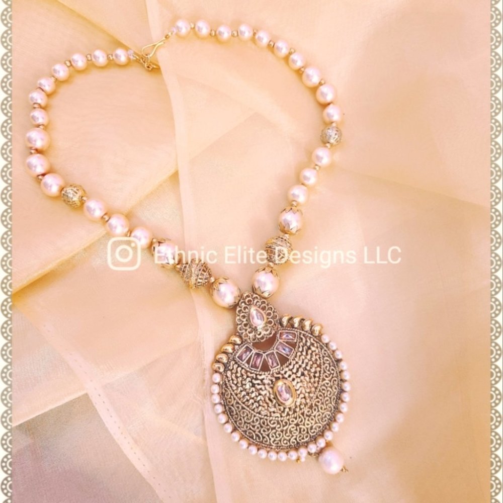 New Vintage faux pearl necklace with cut stones and ornate antique gold pendant